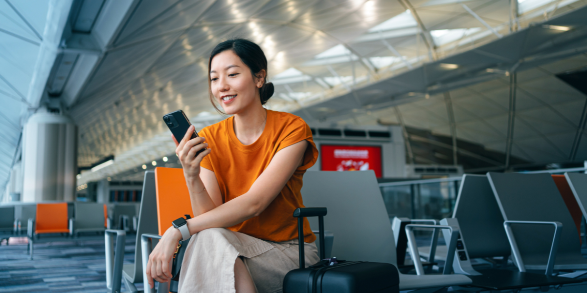 a business leader waiting at the boarding gate