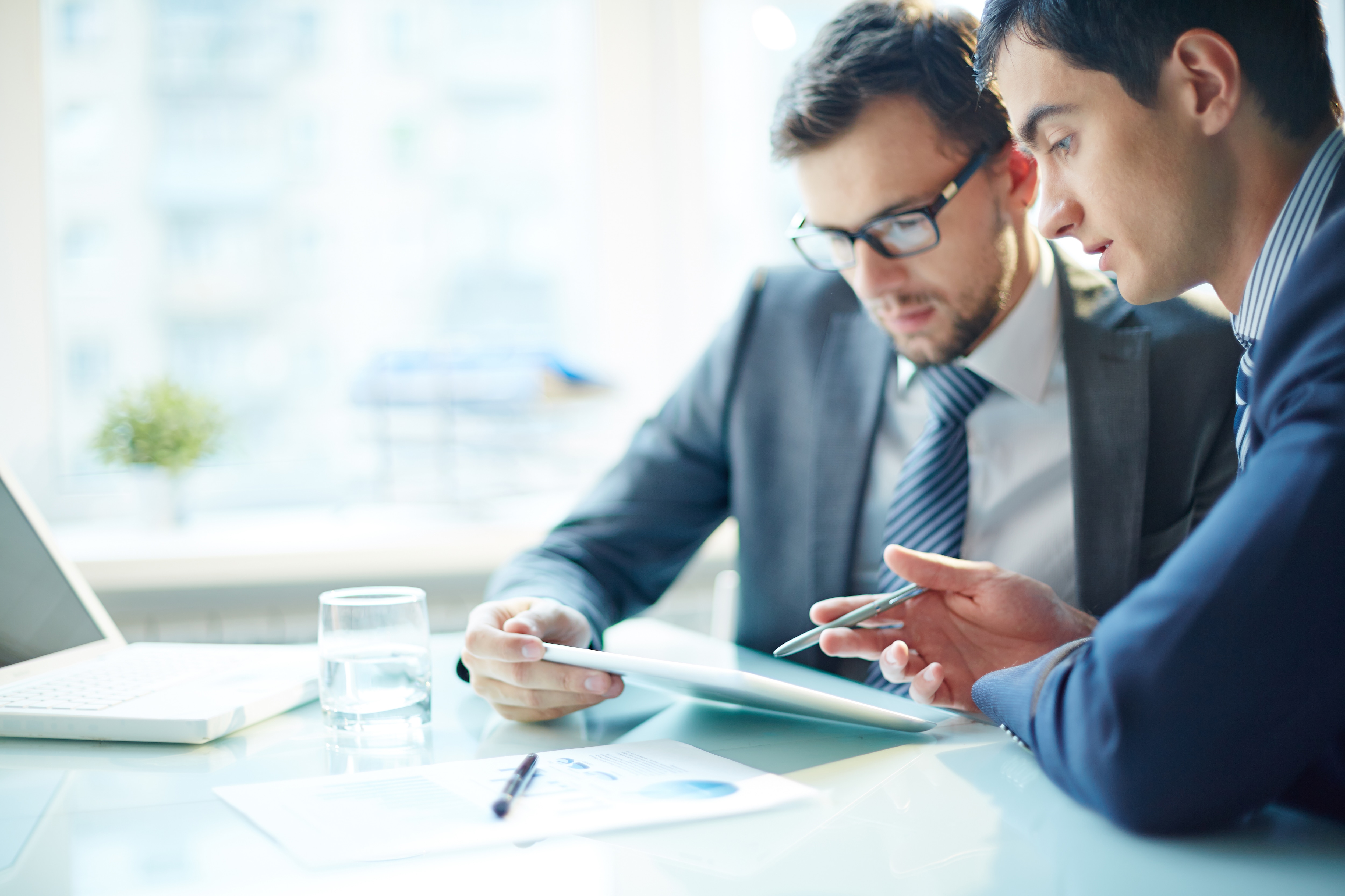 Two men in AP looking at their current solution and thinking about SAP Concur