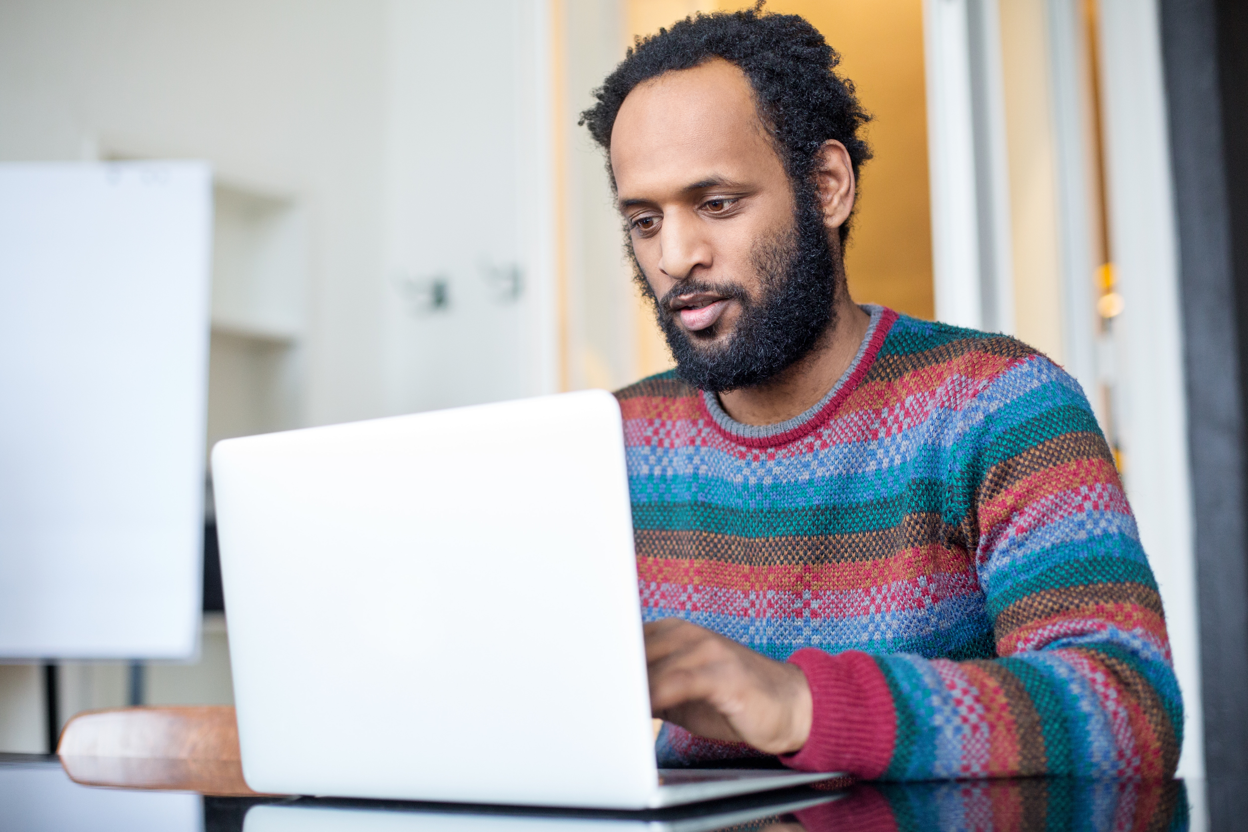 a smal business finance leader reviewing expense management solution