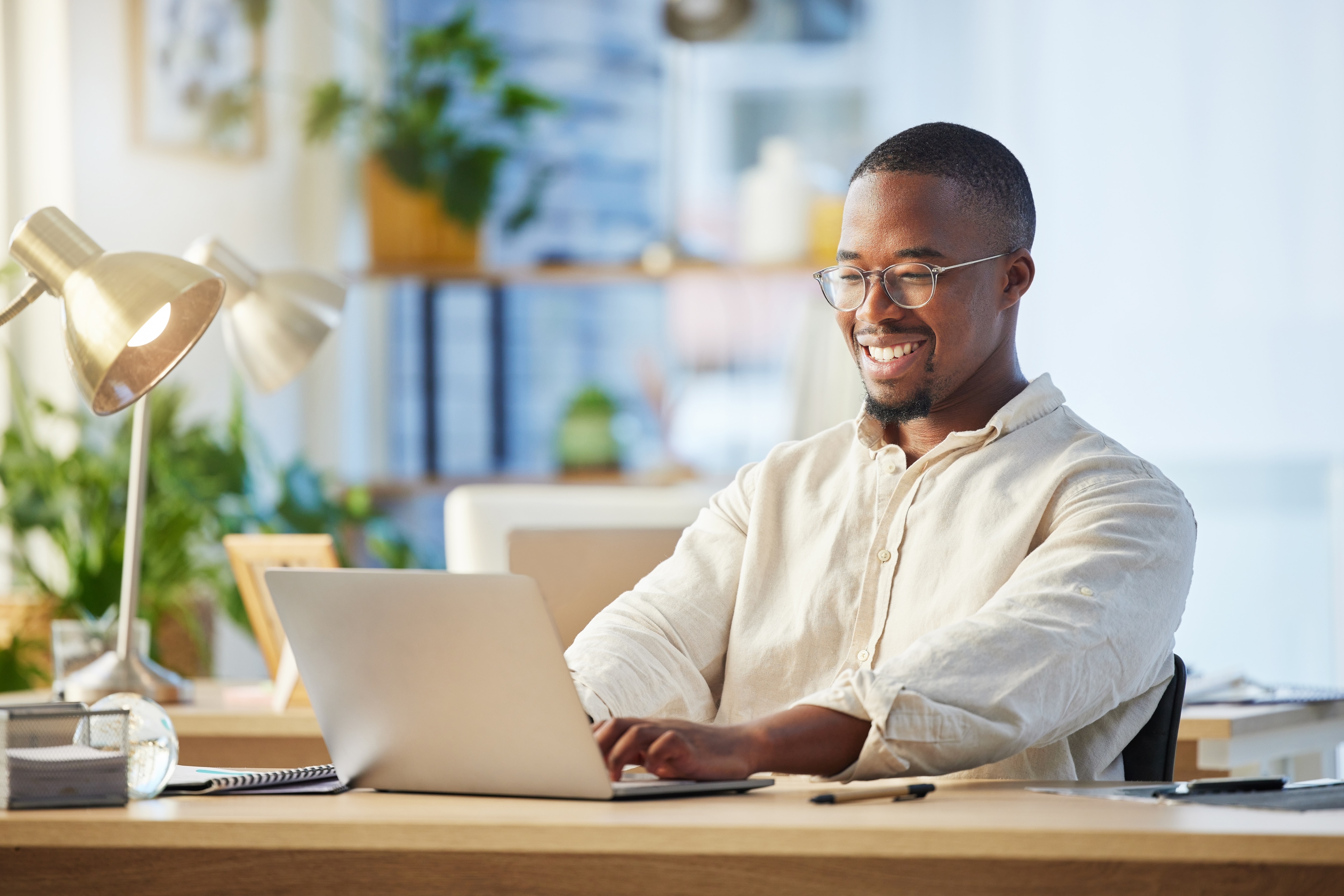 a finance leader sitting by the desk 