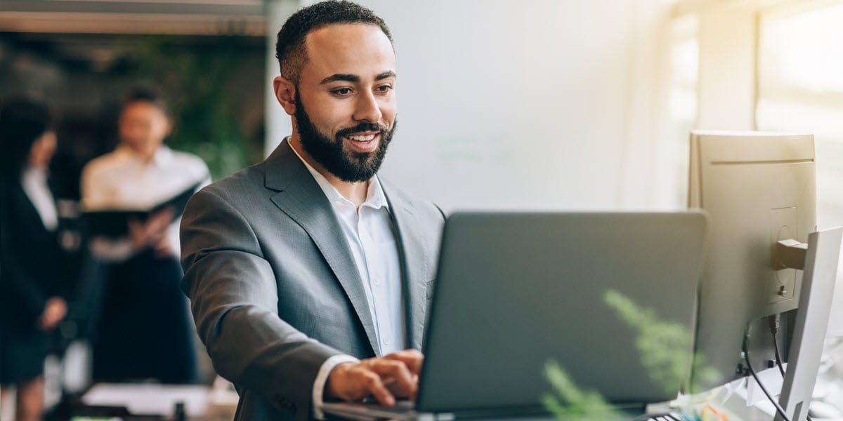 man looking at computer