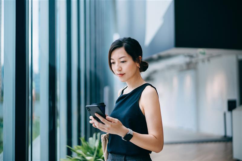 Two people in an office working together