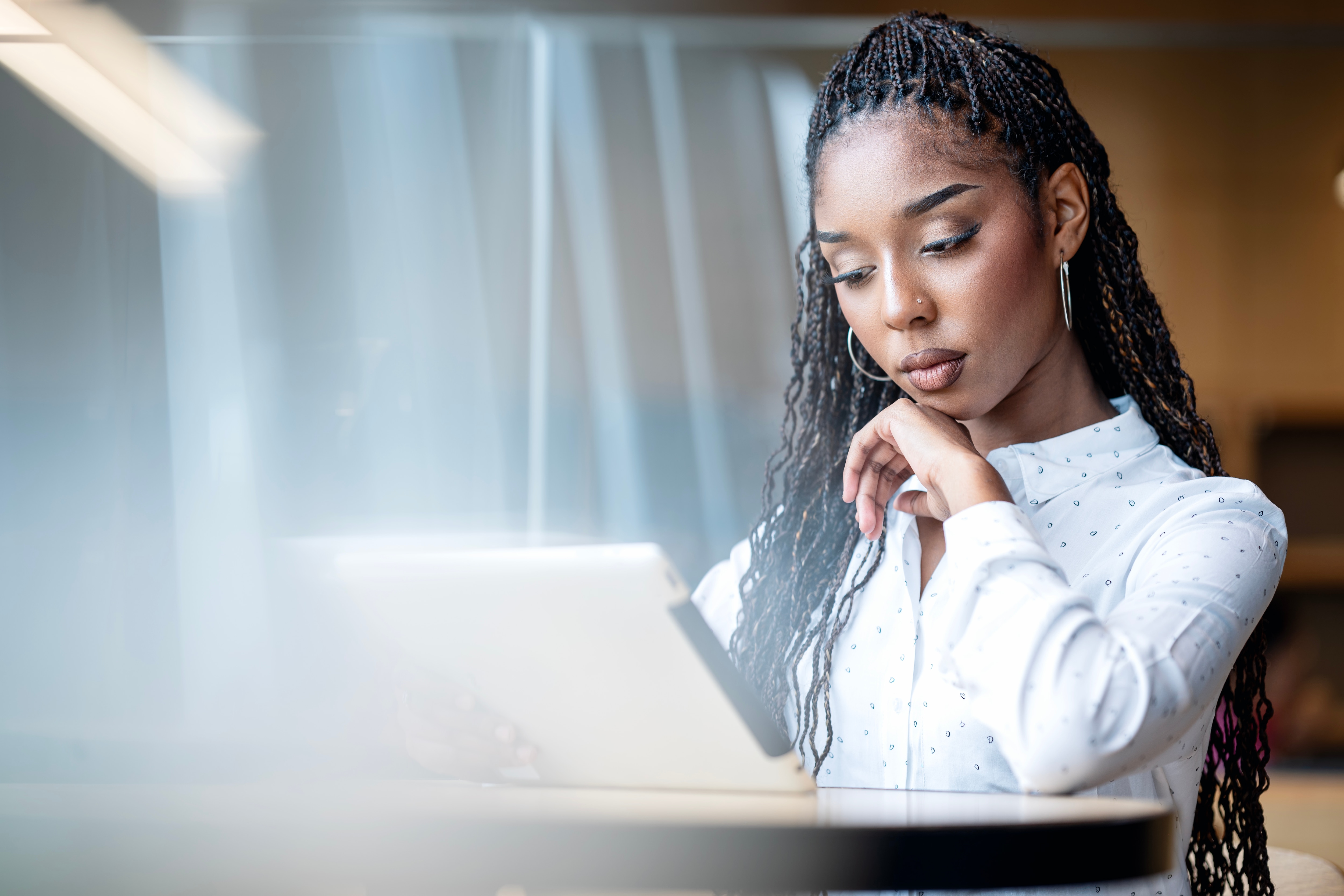 a business woman reviewing company financial data 