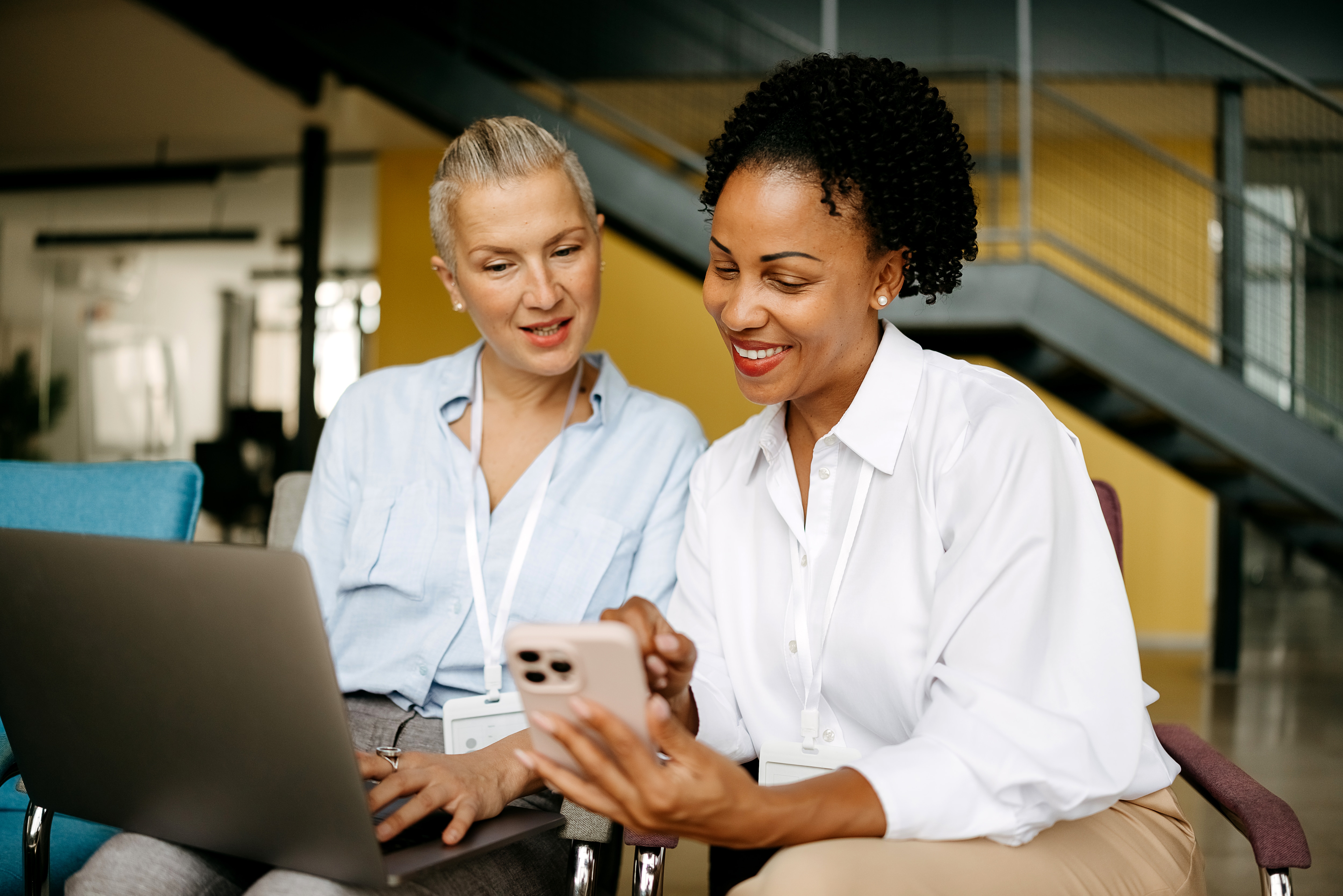 two business woman discussing key accounts payable metrics