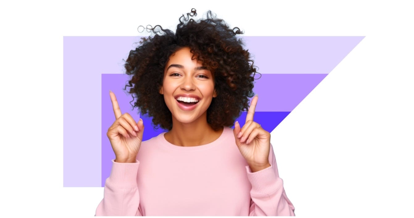 woman smiling and pointing upward
