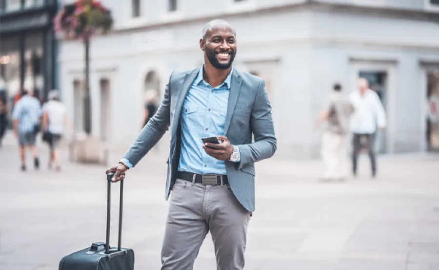 Man with a suitcase on a street