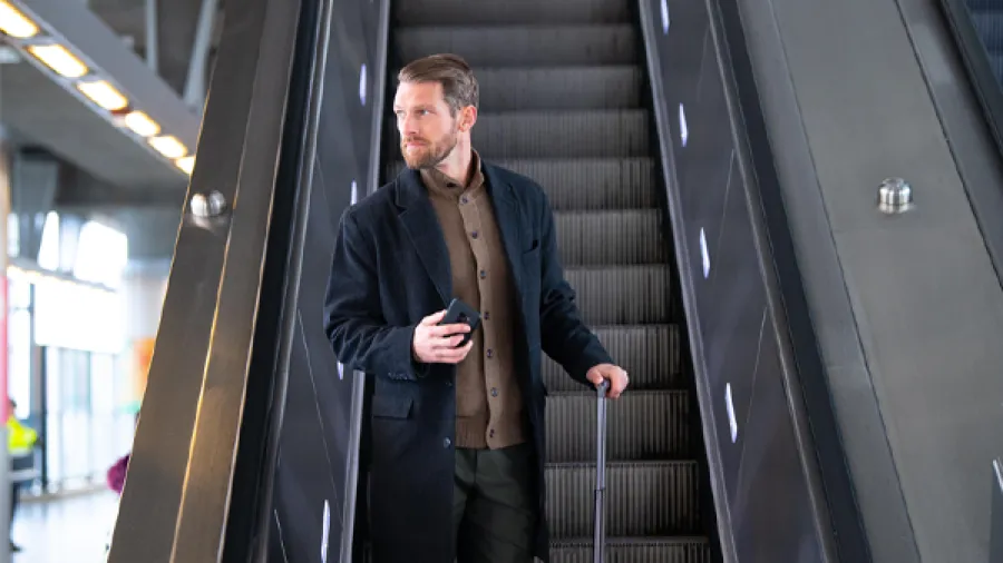 business traveler boarding a train