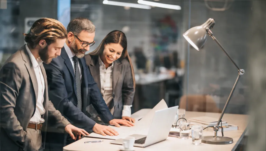 business collaborators using laptop