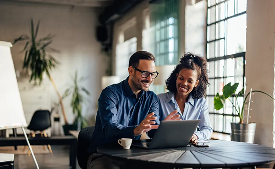 business professionals using T&E
