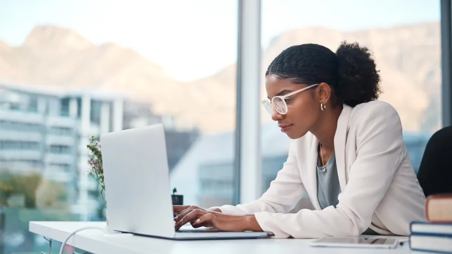 business professional working on laptop