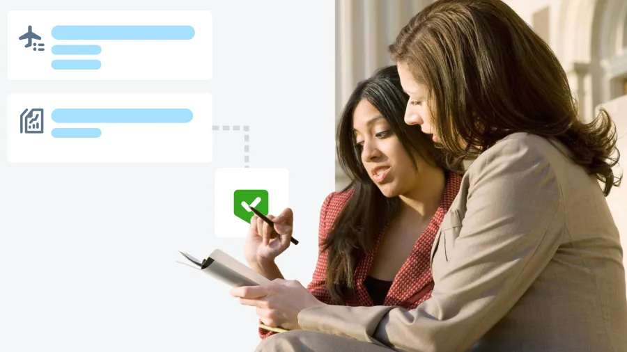 two women going through checklist