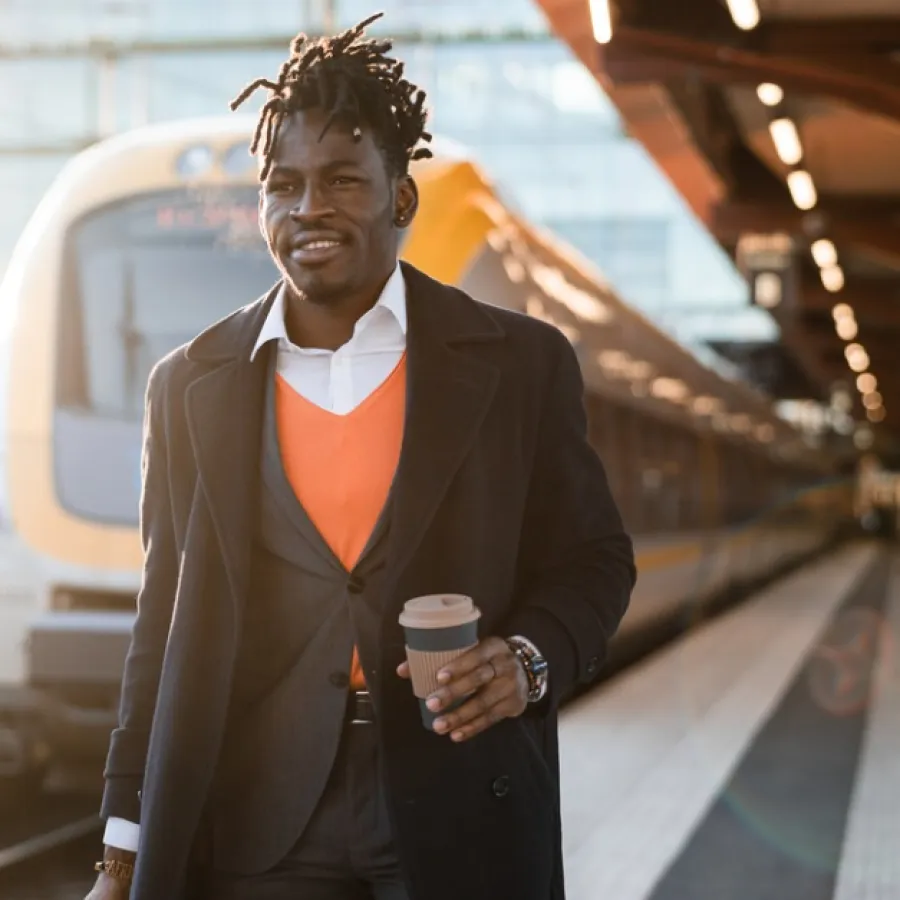 businessman walking on the train