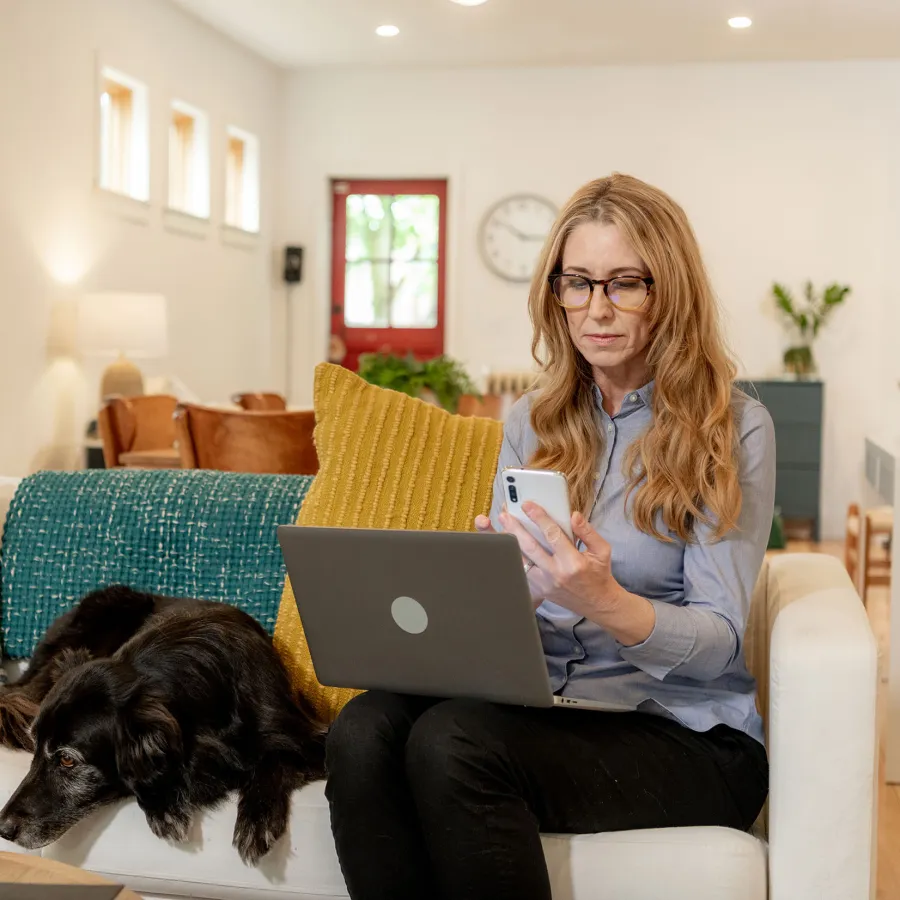 working girl on phone and laptop