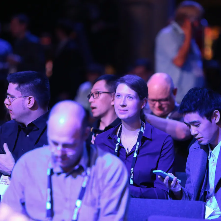 Event attendees sit in a Keynote hall