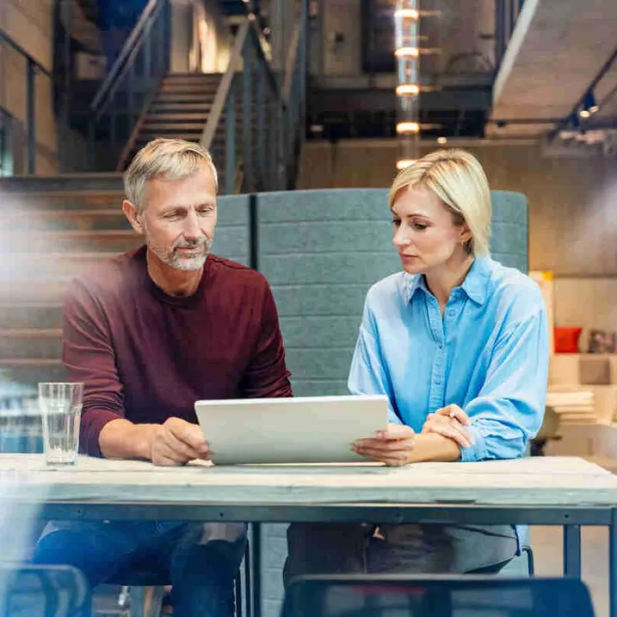 two people working together