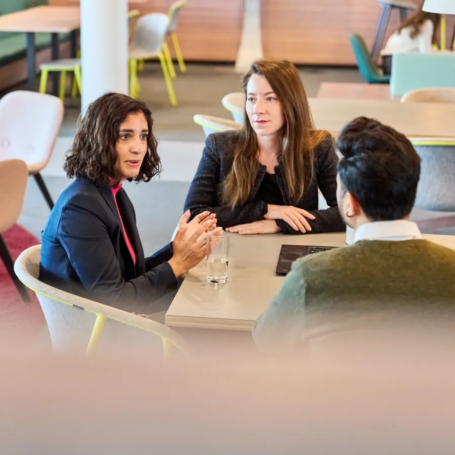 three people discussing artificial intelligence