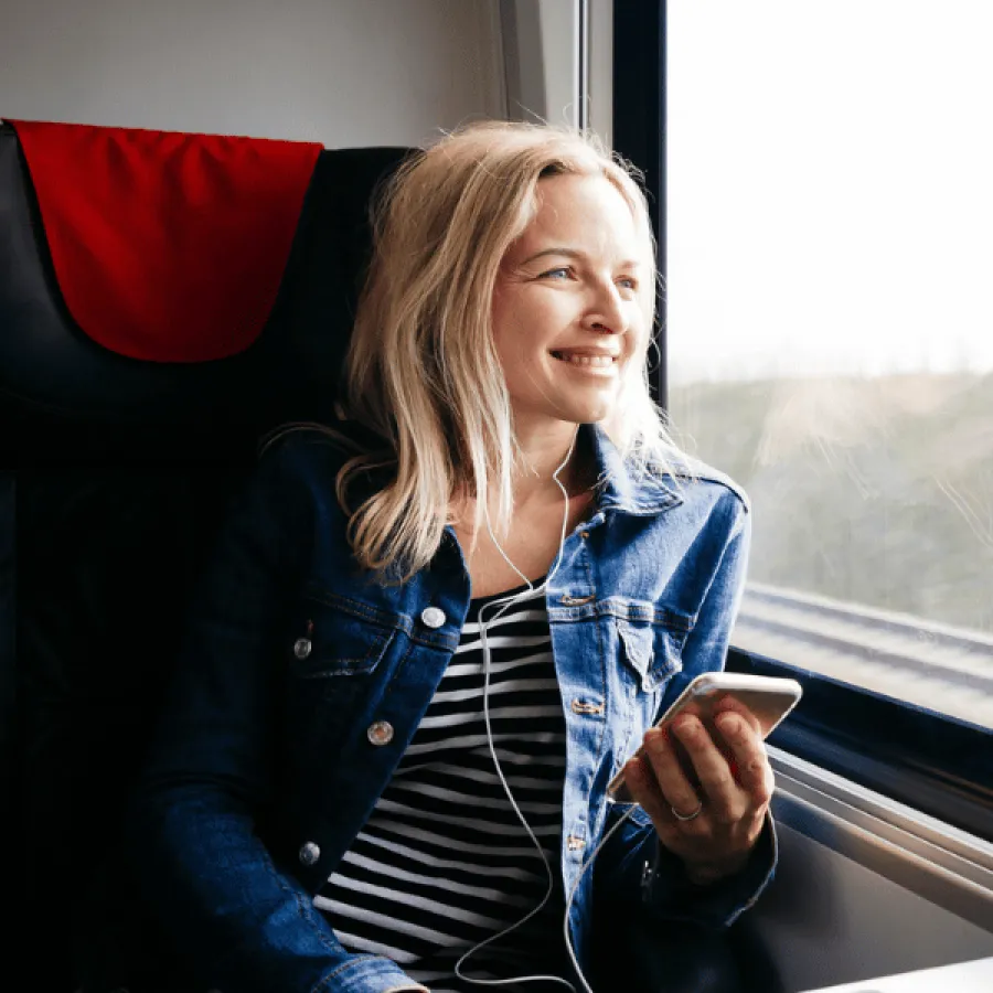 woman smiling on train